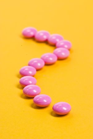 purple tablets on yellow background