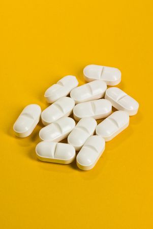 tablets on yellow background