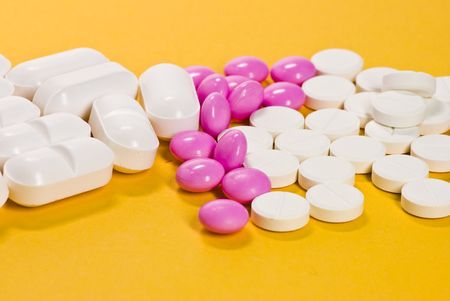 tablets on yellow background