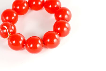 red bracelet isolatedの写真素材
