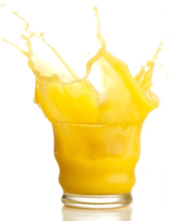 orange juice splash on a white backgroundの写真素材