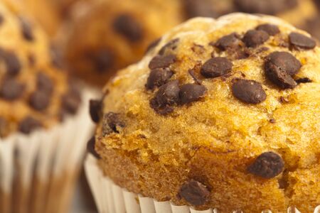 extreme closeup of delicious chocolate muffin with chipsの写真素材