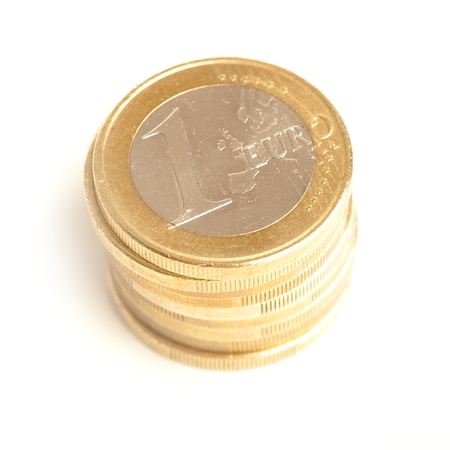 euro coins and banknotes on a white backgroundの写真素材