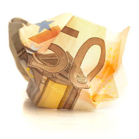 crumpled euro banknotes isolated o white backgroundの写真素材