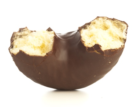 bite chocolate donuts on a white backgroundの写真素材