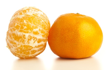 mandarin orange peeled on a white backgroundの写真素材