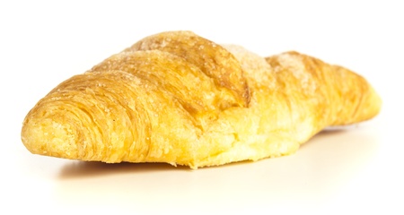 sweet croissant isolated on a white backgroundの写真素材