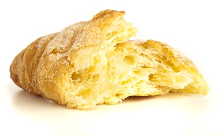 sweet croissant isolated on a white backgroundの写真素材
