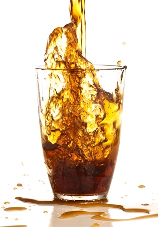 brown beverage splash on a white backgroundの写真素材
