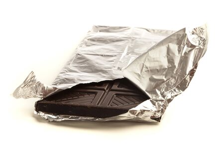 dark chocolate bar isolated on a white backgroundの写真素材