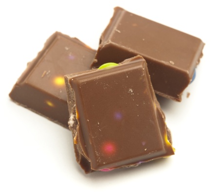 chocolate with candies isolated on a white background