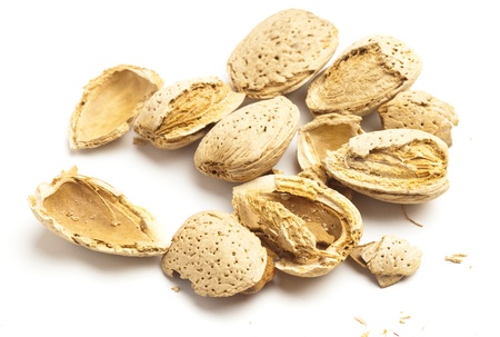 cracked almond isolated on a white background