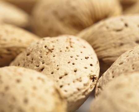 delicious shelled almonds stack texture, extreme closeup