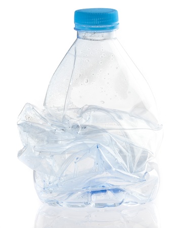 crushed bottle isolated on a white backgroundの写真素材