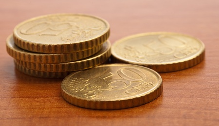 euro cent coin closeup on a wooden surface