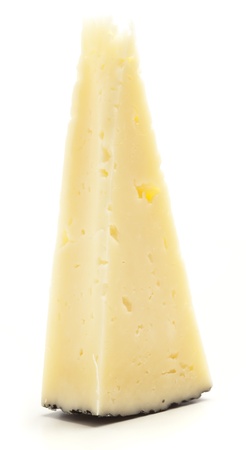 semi hard cheese piece on a white backgroundの写真素材