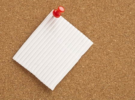 note on a corkboard, extreme closeup photoの写真素材