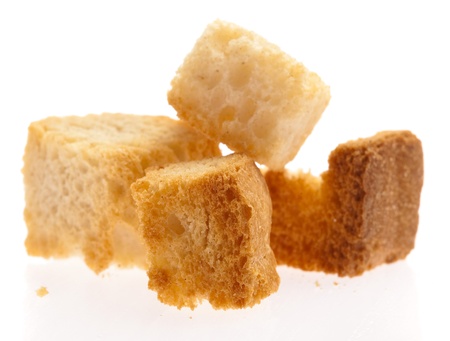 toast croutons isolated on a white backgroundの写真素材
