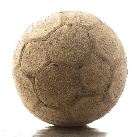 old soccer ball on a white backgroundの写真素材