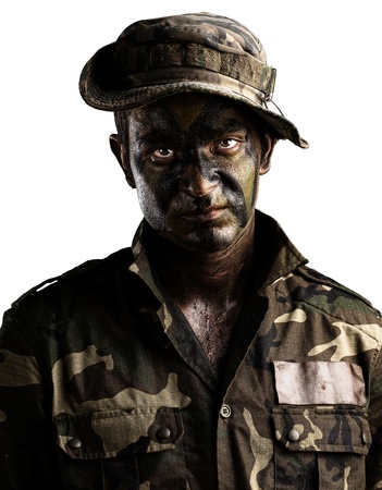 young soldier face with jungle camouflage on white backgroundの写真素材