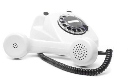 vintage white telephone isolated over white backgroundの写真素材