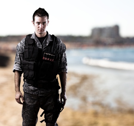 young soldier near the sea shore