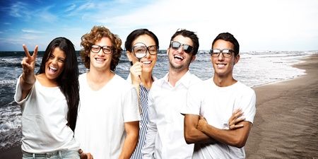 young scientific team enjoying near the sea shoreの写真素材