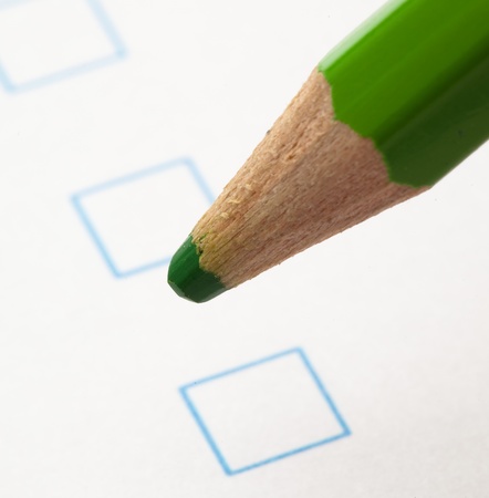 questionnaire check box and greeen crayon, closeupの写真素材