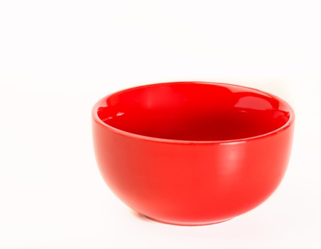 Red porcelain bowl isolated on white backgroundの写真素材