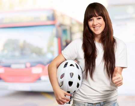 Portrait Of A Young Female Holding A Helmet, Outdoorの写真素材