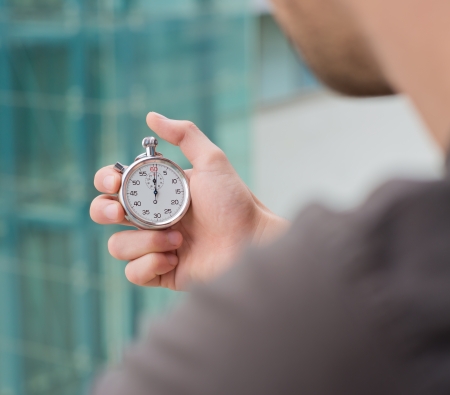 Man Holding A Stopwatchの写真素材