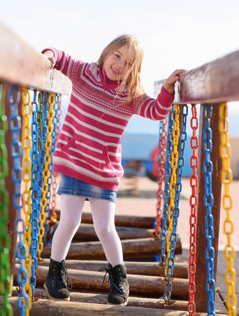 Small Blonde Girl Playing In Park, Outdoors
の写真素材