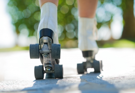 Close-up Of Woman's Legs With Roller Skates, Outdoors