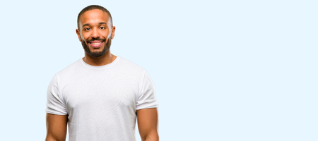 African american man with beard side view portrait isolated over blue backgroundの写真素材