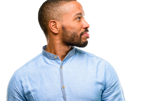 African american man with beard side view portrait isolated over white backgroundの写真素材