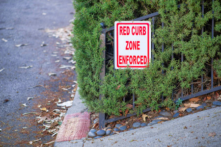 Small red curb zone in a suburban neighborhood in the downtown districts of historic san francisco...
