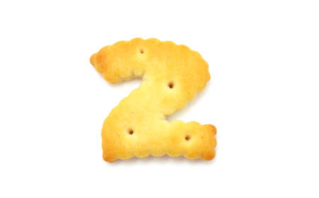 Yellow cookies in the form of figures on a white backgroundの写真素材