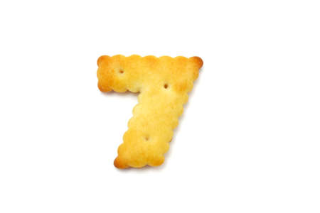 Yellow cookies in the form of figures on a white backgroundの写真素材