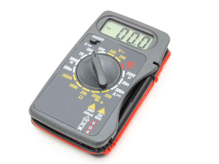 Multimeter of black color with a red and black wire on a white backgroundの写真素材