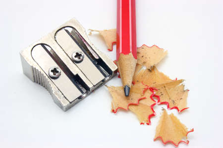 shot of eraser, pencil and pencil metal double sharpener on a white backgroundの写真素材