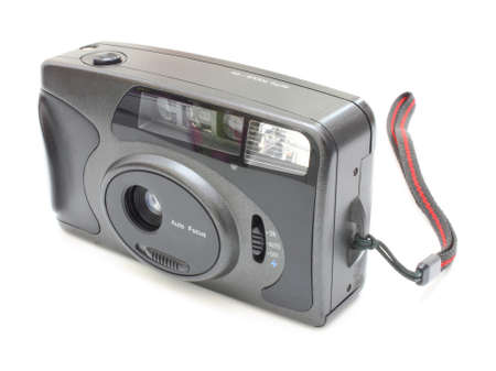 The old film camera of gray color on a white background