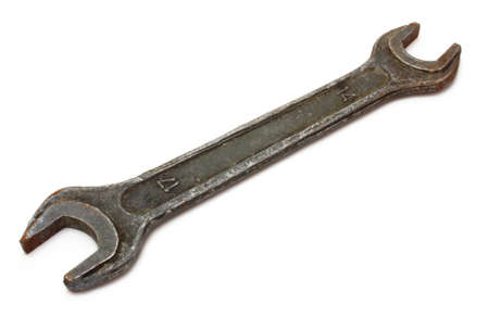 The steel wrench lies on a white background