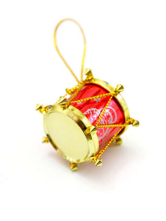 red toy as drum against the white backgroundの写真素材