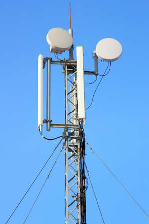Aerial mobile communication  against the blue sky