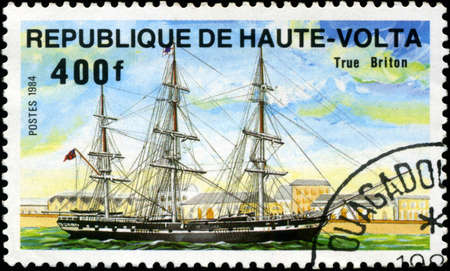 REPUBLIC OF UPPER VOLTA- CIRCA 1984: A stamp printed in Republic of Upper Volta shows the ship 'True...
