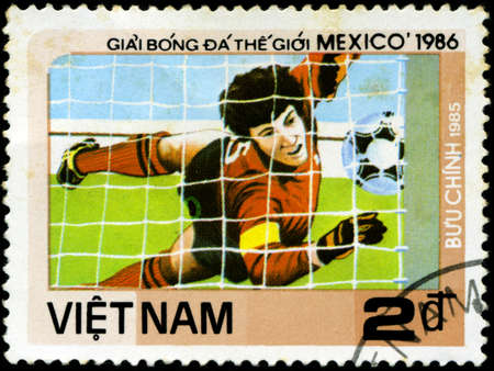 VIETNAM - CIRCA 1985  a stamp printed by VIETNAM shows football players  World football cup in Mexico 1986, circa 1985のeditorial素材