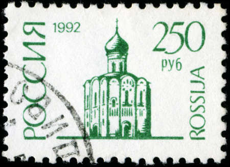 RUSSIA - CIRCA 1992: A stamp printed in Russia shows Church of the Intercession of the Holy Virgin on the Nerl River is an Orthodox church and a symbol of mediaeval Russia, circa 1992のeditorial素材