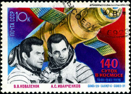 USSR - CIRCA 1978: A stamp printed by USSR, shows astronauts cosmonauts Kovalenok and Ivanchenkov , Salyut 6- Soyuz, circa 1978のeditorial素材