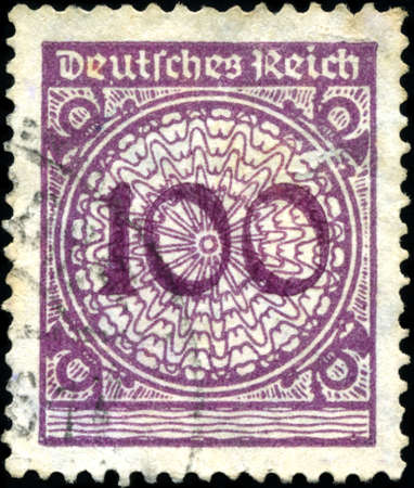 GERMANY - CIRCA 1924: A stamp printed in Germany shows 100 marks, circa 1924のeditorial素材