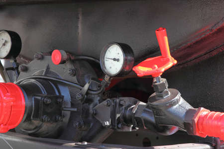 faucet and pressure gauge hydraulics fire truckの写真素材